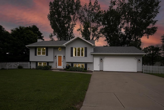 324 Nancy Ln, Pulaski, WI 54162 - view of front of home with concrete driveway, an attached garage, and a chimney