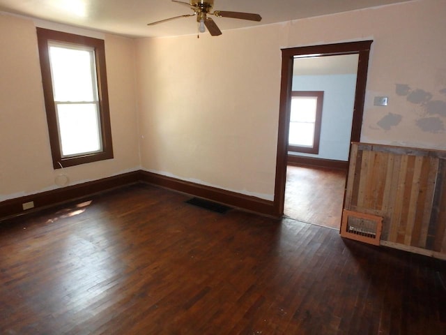 328 2nd St, Menasha, WI 54952 - empty room with dark wood-style flooring and ceiling fan