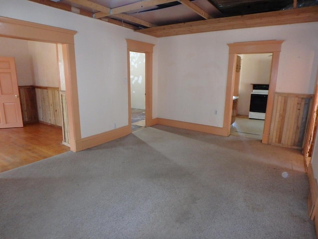 328 2nd St, Menasha, WI 54952 - spare room with carpet flooring and beam ceiling