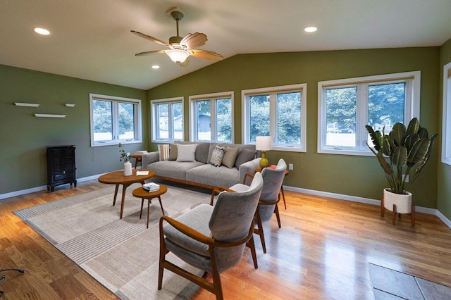 3424 Geneva Ln, La Crosse, WI 54601 - living room with healthy amount of natural light, a ceiling fan, lofted ceiling, light wood-style flooring, and recessed lighting