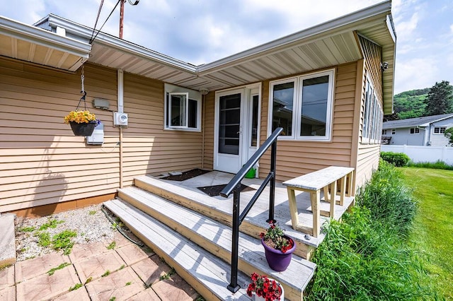 3424 Geneva Ln, La Crosse, WI 54601 - view of exterior entry with a wooden deck