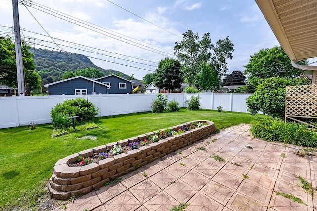 3424 Geneva Ln, La Crosse, WI 54601 - fenced backyard featuring a patio area