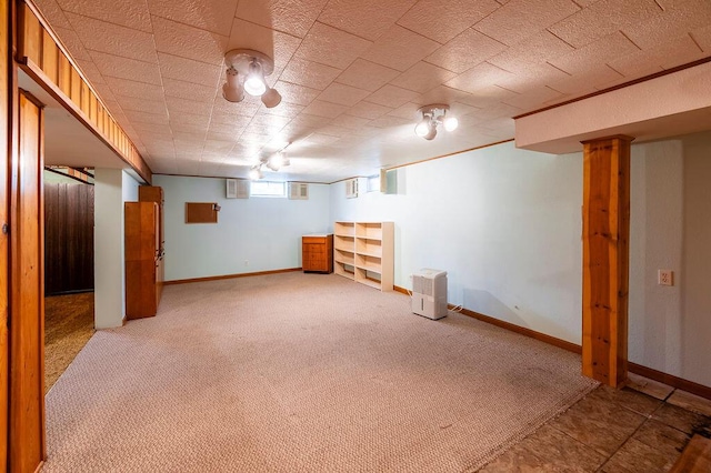 3424 Geneva Ln, La Crosse, WI 54601 - below grade area featuring baseboards and light colored carpet