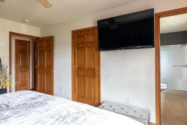 217 Lemongrass Way, Kaukauna, WI 54130 - bedroom featuring tile patterned floors, ceiling fan, and connected bathroom