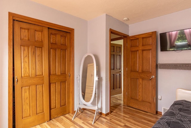 217 Lemongrass Way, Kaukauna, WI 54130 - bedroom featuring light wood finished floors and baseboards
