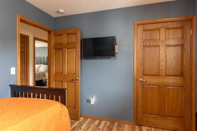217 Lemongrass Way, Kaukauna, WI 54130 - bedroom with wood finished floors and baseboards