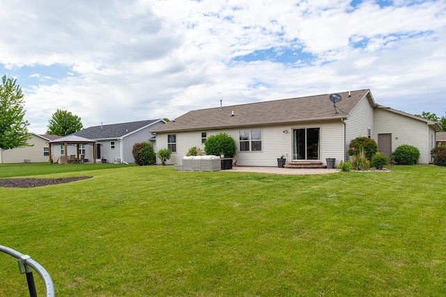 217 Lemongrass Way, Kaukauna, WI 54130 - back of house featuring a patio and a yard