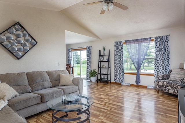 217 Lemongrass Way, Kaukauna, WI 54130 - living area featuring light wood-type flooring, a ceiling fan, and vaulted ceiling