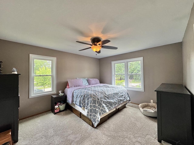 501 Hartridge Dr, Hartland, WI 53029 - carpeted bedroom with a ceiling fan