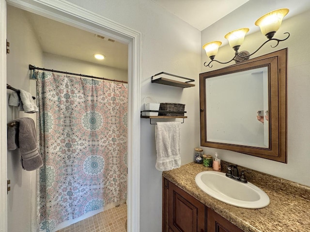 501 Hartridge Dr, Hartland, WI 53029 - bathroom with vanity and a shower with shower curtain