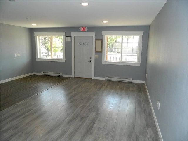 E150 Menonmonie St, Elk Mound, WI 54739 - entryway featuring a baseboard heating unit, healthy amount of natural light, wood finished floors, and recessed lighting