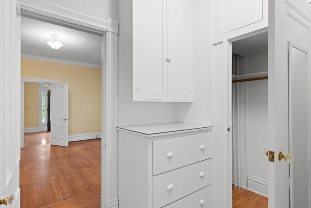 204 E Huron St, Berlin, WI 54923 - spacious closet with wood finished floors and a baseboard radiator
