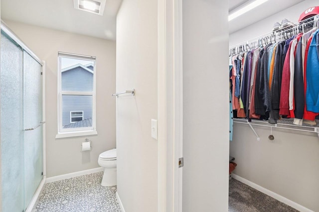6017 Lyda Woods Ln, Madison, WI 53718 - full bathroom with a stall shower and a spacious closet