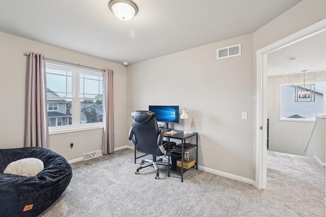 6017 Lyda Woods Ln, Madison, WI 53718 - carpeted office space with baseboards and a chandelier