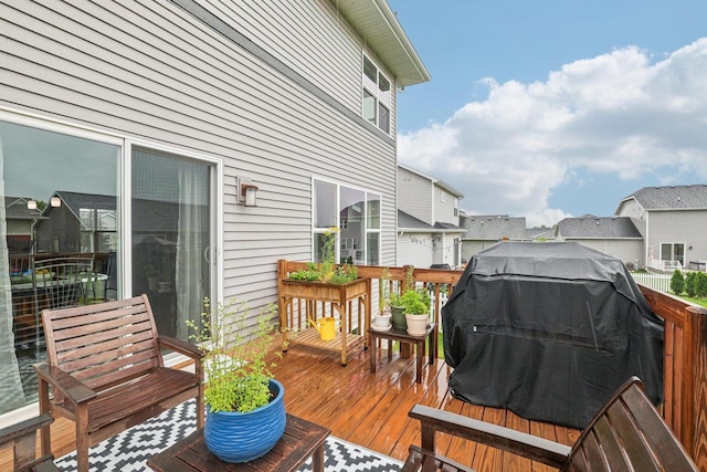 6017 Lyda Woods Ln, Madison, WI 53718 - deck with grilling area and a residential view