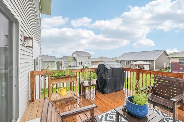 6017 Lyda Woods Ln, Madison, WI 53718 - wooden deck featuring a residential view and grilling area