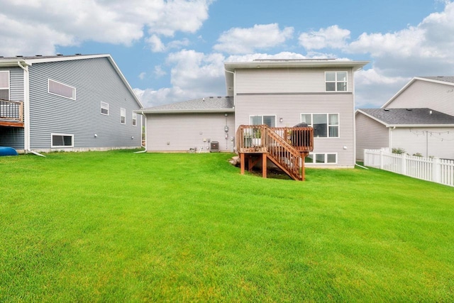 6017 Lyda Woods Ln, Madison, WI 53718 - back of house featuring a wooden deck and stairs