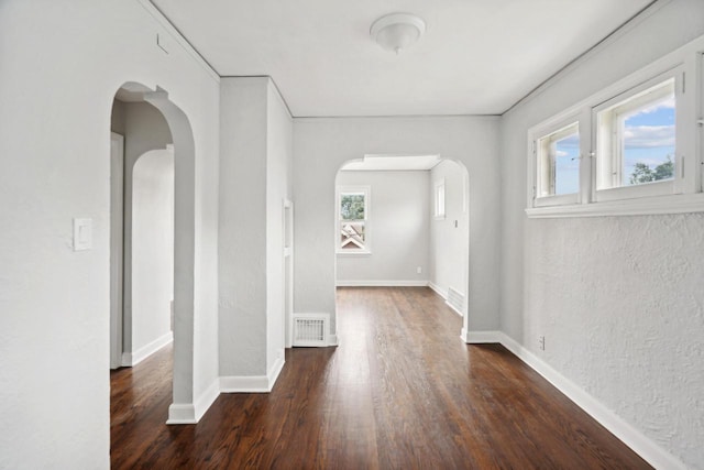 4059 N 7th St Unit 4059A, Milwaukee, WI 53209 - hall featuring arched walkways and wood finished floors