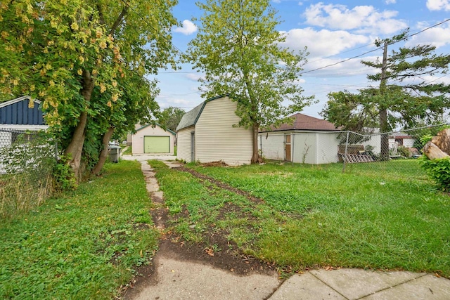 4059 N 7th St Unit 4059A, Milwaukee, WI 53209 - view of yard with a garage and an outbuilding