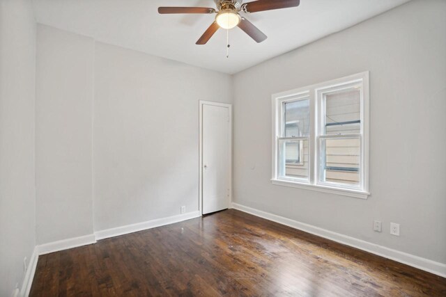 4059 N 7th St Unit 4059A, Milwaukee, WI 53209 - spare room with dark wood-style floors and a ceiling fan