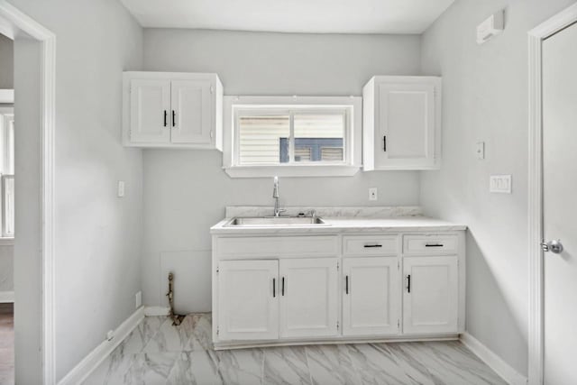 4059 N 7th St Unit 4059A, Milwaukee, WI 53209 - washroom featuring a sink and light marble finish flooring