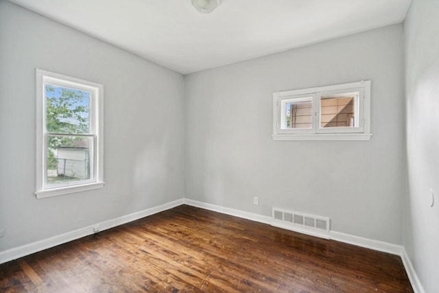 4059 N 7th St Unit 4059A, Milwaukee, WI 53209 - spare room featuring dark wood-type flooring