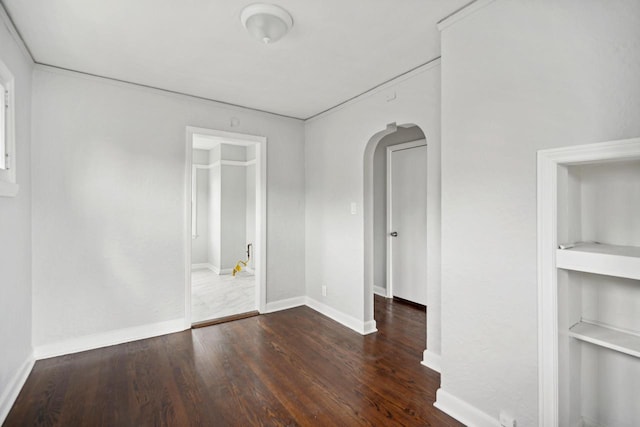 4059 N 7th St Unit 4059A, Milwaukee, WI 53209 - spare room featuring arched walkways and wood finished floors