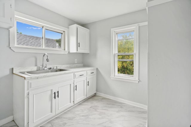 4059 N 7th St Unit 4059A, Milwaukee, WI 53209 - laundry room with light marble finish floors and plenty of natural light