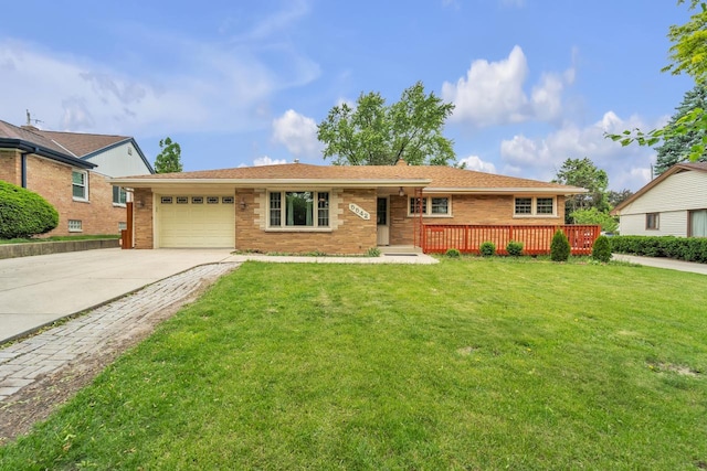 5542 W Jerelyn Pl, Milwaukee, WI 53219 - ranch-style house featuring an attached garage, concrete driveway, a front lawn, and brick siding