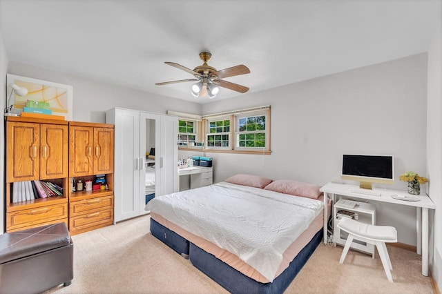 5542 W Jerelyn Pl, Milwaukee, WI 53219 - bedroom with light carpet and a ceiling fan