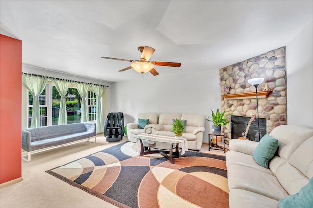 5542 W Jerelyn Pl, Milwaukee, WI 53219 - carpeted living room featuring a ceiling fan and a stone fireplace