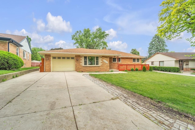 5542 W Jerelyn Pl, Milwaukee, WI 53219 - single story home with brick siding, a front lawn, concrete driveway, and an attached garage