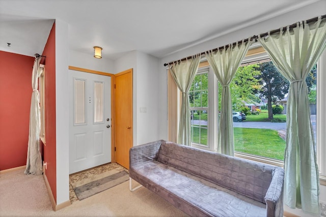 5542 W Jerelyn Pl, Milwaukee, WI 53219 - foyer featuring light carpet and baseboards