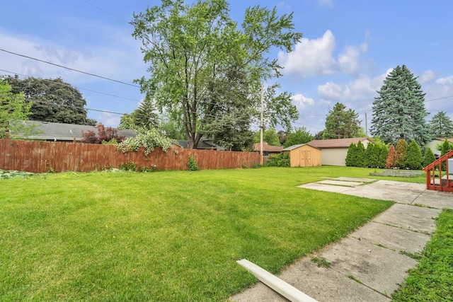 5542 W Jerelyn Pl, Milwaukee, WI 53219 - view of yard featuring a storage shed and a patio