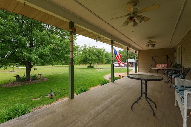 4114 Sheard Rd, Dover, WI 53139 - deck featuring a ceiling fan and a lawn