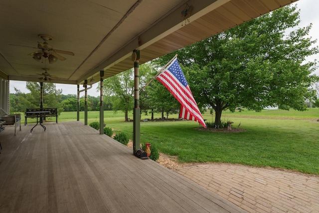 4114 Sheard Rd, Dover, WI 53139 - wooden terrace with a patio, a lawn, and a ceiling fan