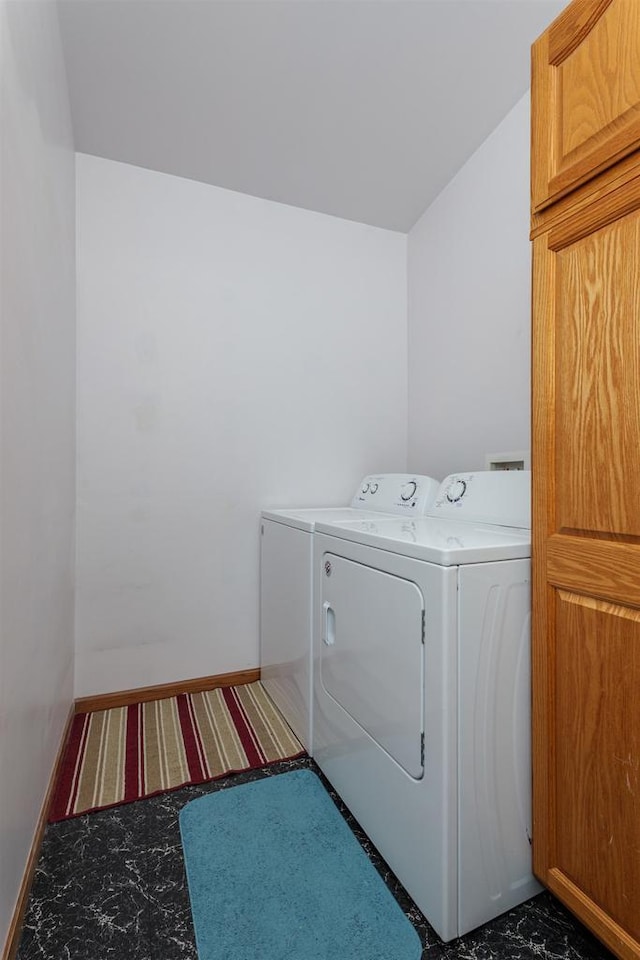 4114 Sheard Rd, Dover, WI 53139 - laundry area featuring washer and clothes dryer and baseboards