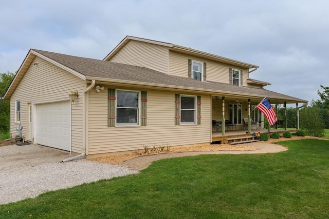 4114 Sheard Rd, Dover, WI 53139 - back of house featuring a porch, driveway, an attached garage, and a lawn