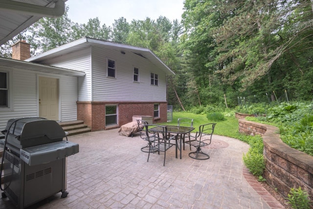 1718 N 13th St, Wausau, WI 54403 - view of patio / terrace with a grill and outdoor dining space