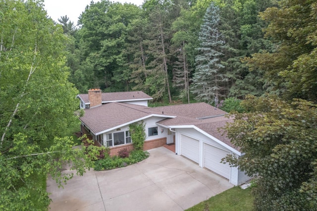 1718 N 13th St, Wausau, WI 54403 - view from above of property with a forest