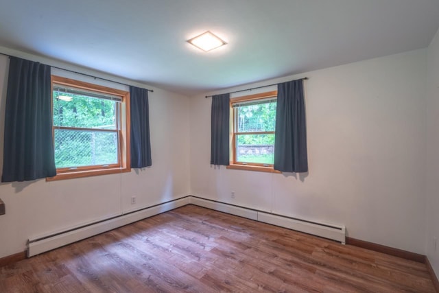1718 N 13th St, Wausau, WI 54403 - empty room featuring wood finished floors