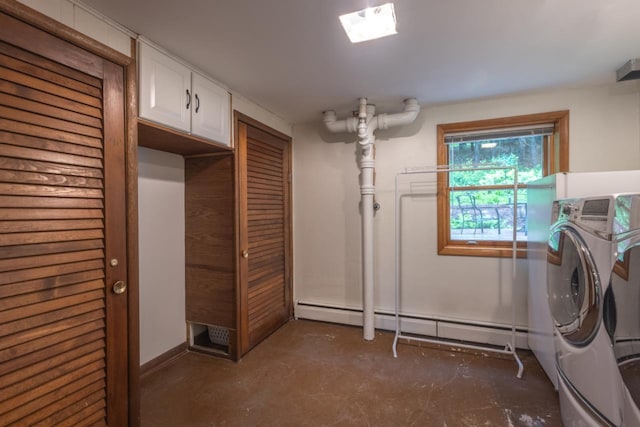 1718 N 13th St, Wausau, WI 54403 - washroom with washer / clothes dryer, a baseboard heating unit, and cabinet space