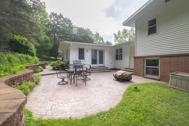 1718 N 13th St, Wausau, WI 54403 - view of patio / terrace featuring entry steps and a fire pit