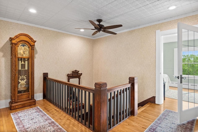 730 3rd St S, Wisconsin Rapids, WI 54494 - corridor with an upstairs landing, wood finished floors, ornamental molding, and recessed lighting