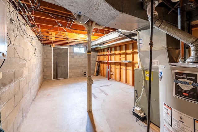 1311 Hickory St, Onalaska, WI 54650 - below grade area featuring water heater