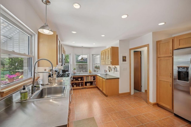 5961 N Lake Dr, Whitefish Bay, WI 53217 - kitchen featuring stainless steel appliances, hanging light fixtures, recessed lighting, and light tile patterned floors