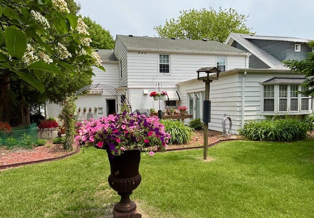 5961 N Lake Dr, Whitefish Bay, WI 53217 - rear view of property featuring a yard
