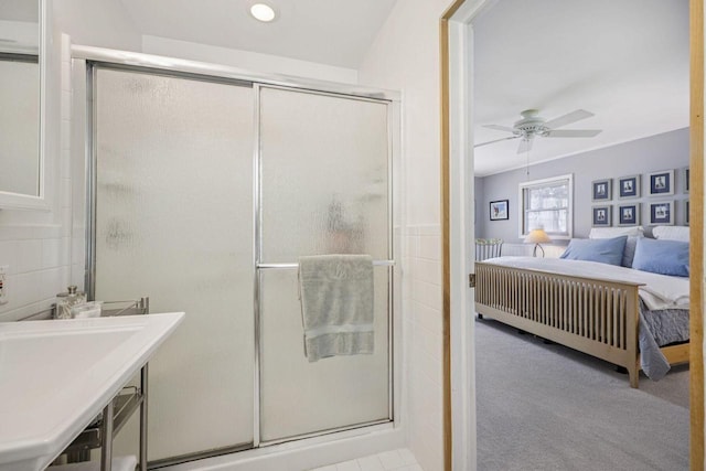 5961 N Lake Dr, Whitefish Bay, WI 53217 - bathroom with ensuite bath, a shower stall, and ceiling fan