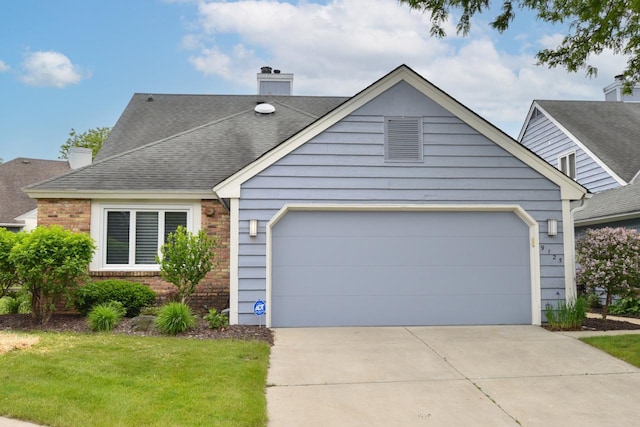 9125 N Briarwood Ct, Bayside, WI 53217 - view of front of home featuring a garage, brick siding, a chimney, and driveway