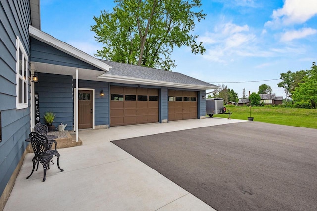 N6965 Thede Rd, Black Creek, WI 54106 - garage featuring asphalt driveway